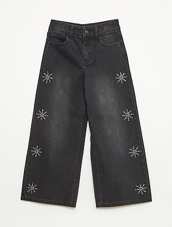 Jeans ampi con fiocchi di neve in strass