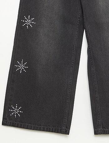 Jeans ampi con fiocchi di neve in strass