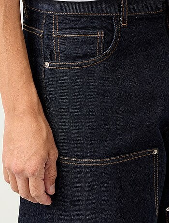 Jeans baggy a tinta unita con inserti fantasia