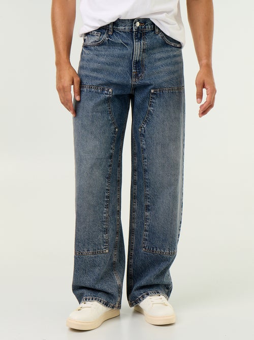 Jeans baggy a tinta unita con inserti fantasia - Kiabi Jeans baggy a tinta unita con inserti fantasia - Kiabi