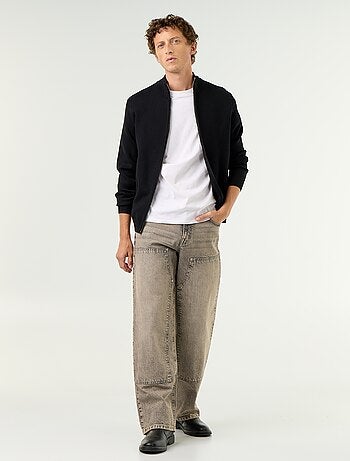 Jeans baggy a tinta unita con inserti fantasia