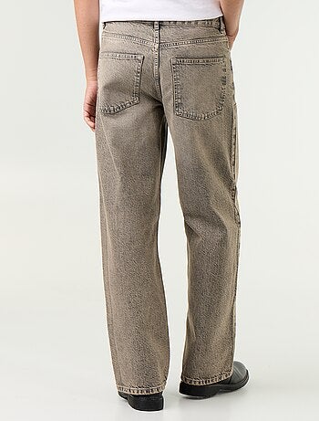 Jeans baggy a tinta unita con inserti fantasia
