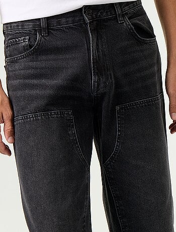 Jeans baggy a tinta unita con inserti fantasia