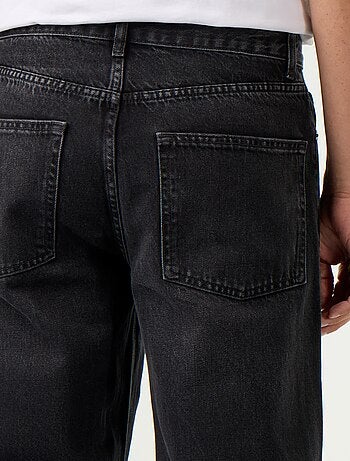 Jeans baggy a tinta unita con inserti fantasia