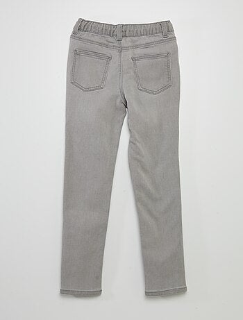 Jeans con vita elasticizzata e cordoncini