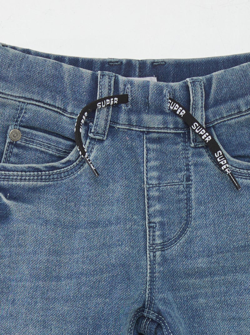 Jeans con vita elasticizzata e cordoncino blu Kiabi 14.00€