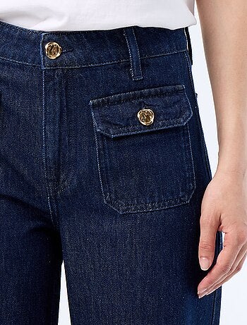 Jeans denim grezzo wide leg con bottoni dorati