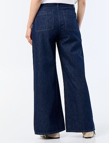 Jeans denim grezzo wide leg con bottoni dorati