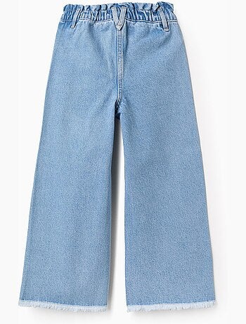 Jeans in cotone a a gamba larga con orli sfrangiati