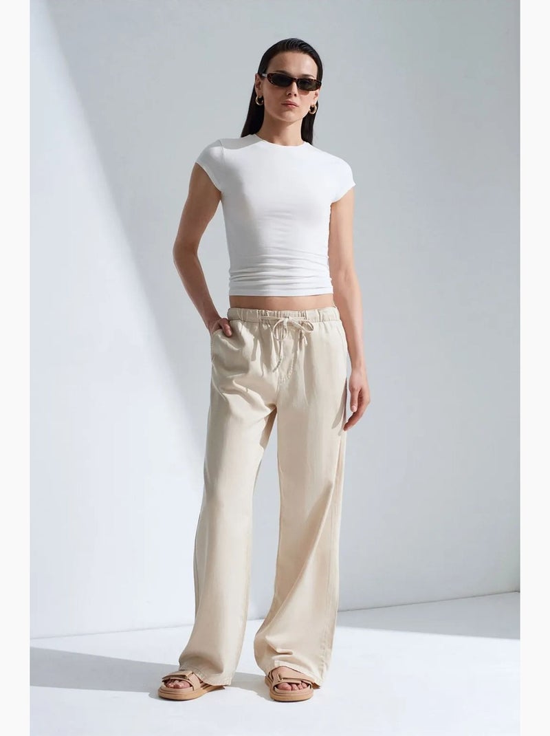 Jeans in denim a gamba ampia a vita media dilvin Beige argilla - Kiabi