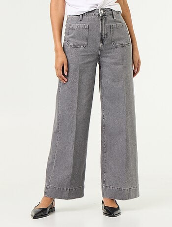Jeans larghi a vita alta con tasche applicate