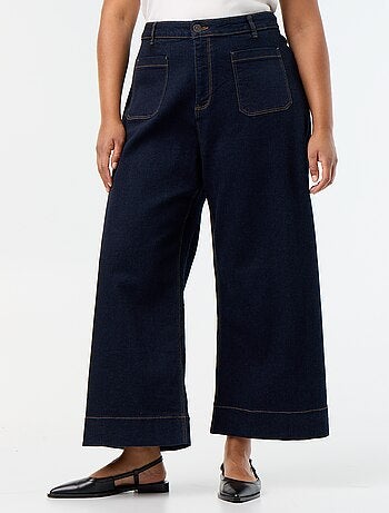 Jeans larghi con tasche applicate