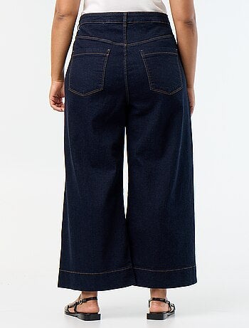 Jeans larghi con tasche applicate