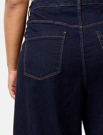 Jeans larghi con tasche applicate