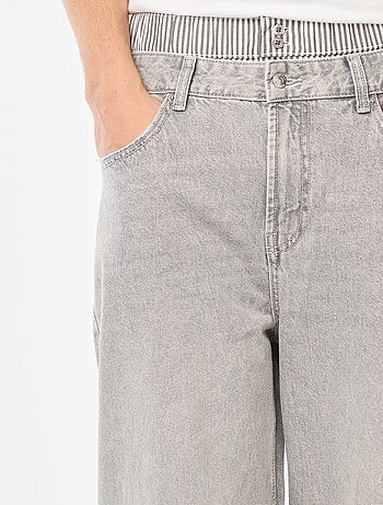 Jeans larghi stile baggy con finto slip integrato in vita
