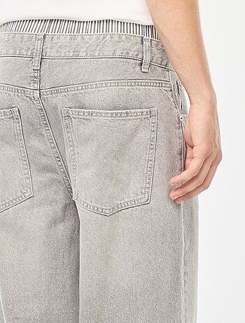 Jeans larghi stile baggy con finto slip integrato in vita