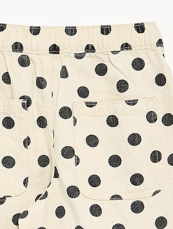Jeans modello barrel con stampa a pois