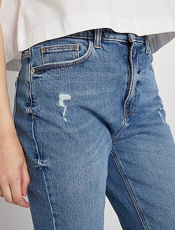 Jeans slim a vita alta con abrasioni