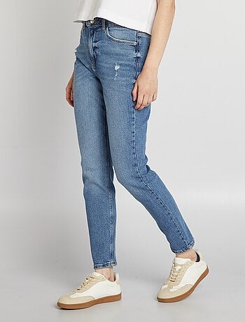 Jeans slim a vita alta con abrasioni