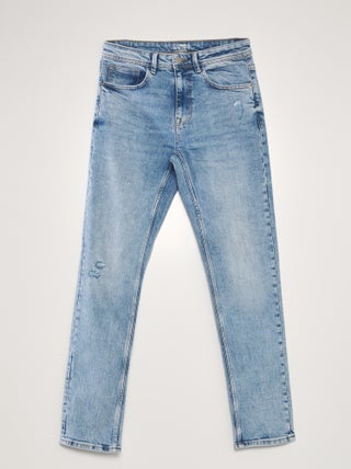Jeans slim con abrasioni - L32