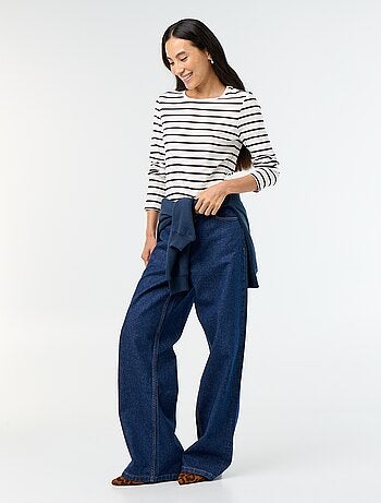 Jeans wide con abbottonatura asimmetrica