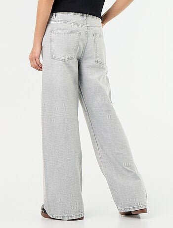 Jeans wide con abbottonatura asimmetrica