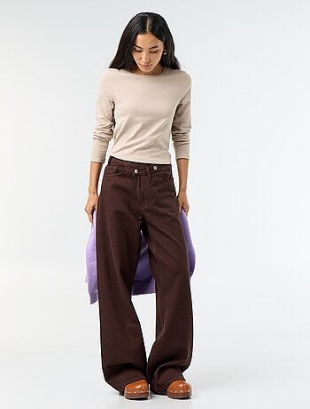 Jeans wide con abbottonatura asimmetrica