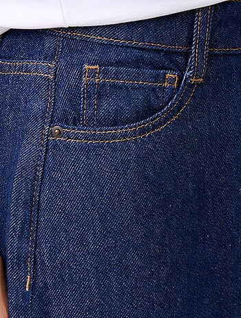 Jeans wide leg a gamba larga con nodi fantasia al fondo