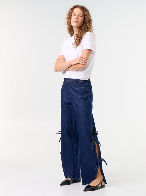 Jeans wide leg a gamba larga con nodi fantasia al fondo - Kiabi