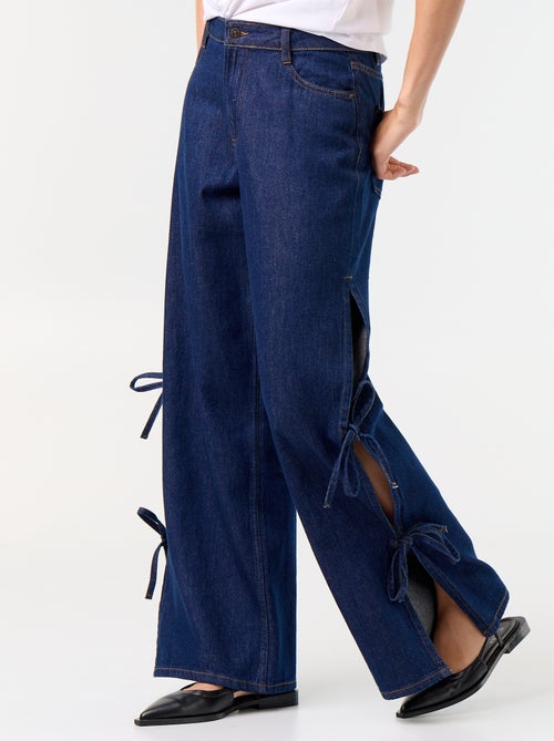 Jeans wide leg a gamba larga con nodi fantasia al fondo - Kiabi