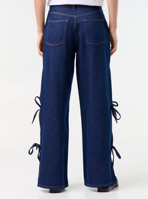 Jeans wide leg a gamba larga con nodi fantasia al fondo - Kiabi