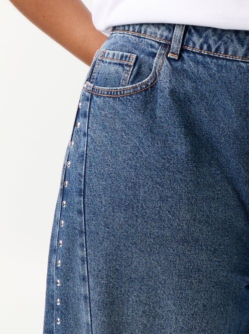 Jeans wide leg con tagli fantasia e borchie - Kiabi Jeans wide leg con tagli fantasia e borchie - Kiabi