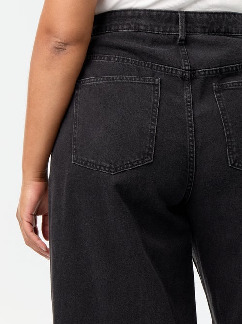 Jeans wide leg con tagli fantasia e borchie - Kiabi Jeans wide leg con tagli fantasia e borchie - Kiabi