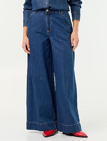 Jeans wide leg con tasche intagliate