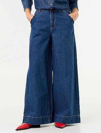 Jeans wide leg con tasche intagliate