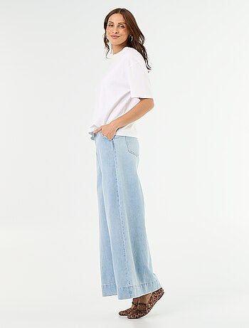 Jeans wide leg con tasche intagliate