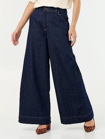 Jeans wide leg con tasche intagliate