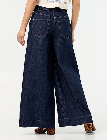 Jeans wide leg con tasche intagliate