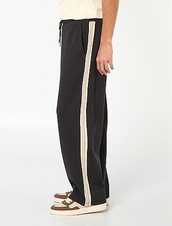 Joggers a gamba larga con banda decorativa