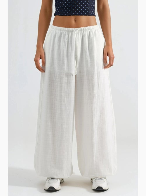 Joggers ampi con vita elastica busem - Kiabi Joggers ampi con vita elastica busem - Kiabi