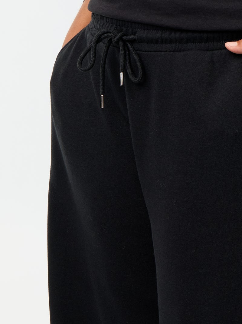 Joggers ampi tinta unita Nero - Kiabi