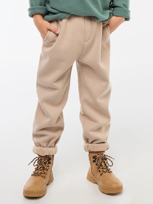 Joggers caldi tinta unita con fodera in pile - Kiabi