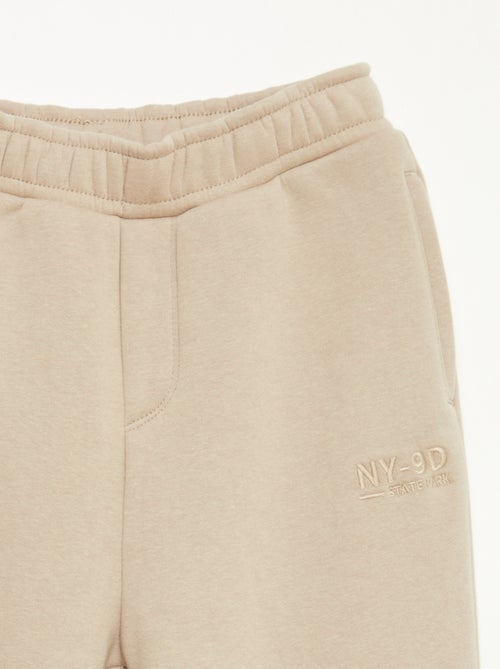 Joggers caldi tinta unita con fodera in pile - Kiabi