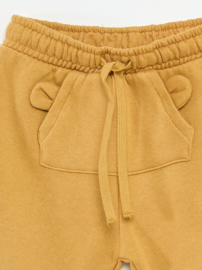 Joggers in felpa con tasca a marsupio e orecchie decorative Beige - Kiabi