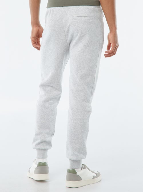 Joggers in felpa garzata con 2 tasche zippate - Kiabi