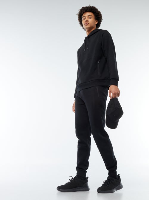 Joggers in felpa garzata con 2 tasche zippate - Kiabi