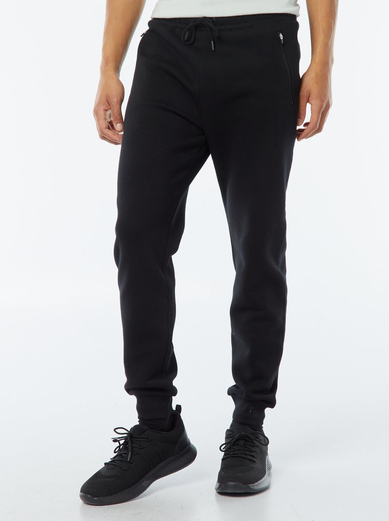 Joggers in felpa garzata con 2 tasche zippate nero - Kiabi