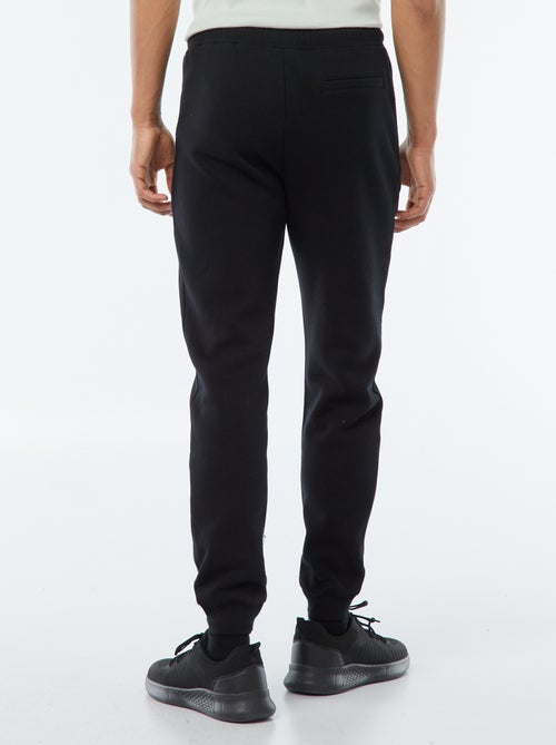 Joggers in felpa garzata con 2 tasche zippate - Kiabi