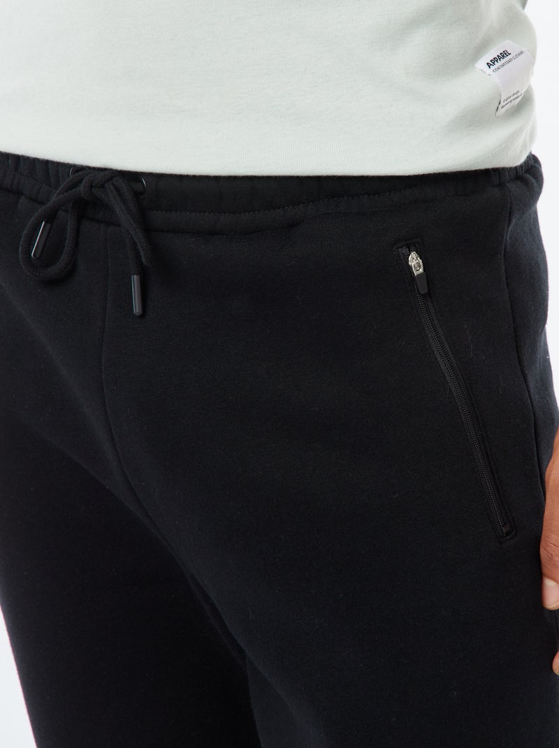 Joggers in felpa garzata con 2 tasche zippate nero - Kiabi