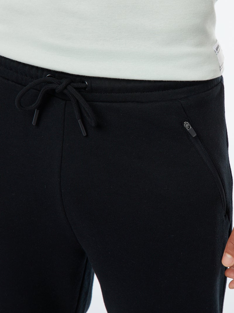 Joggers in felpa leggera con tasche zippate Nero - Kiabi